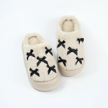 Жіночі домашні капці з бантиками у бежевому кольорі