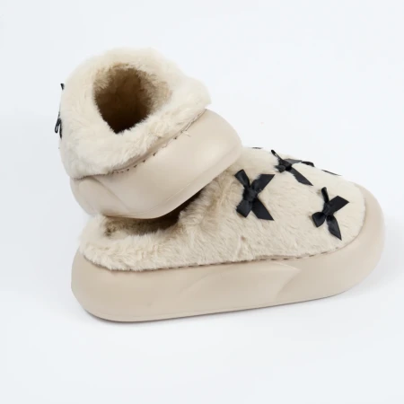 Жіночі домашні капці з бантиками у бежевому кольорі