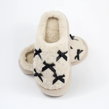 Жіночі домашні капці з бантиками у бежевому кольорі